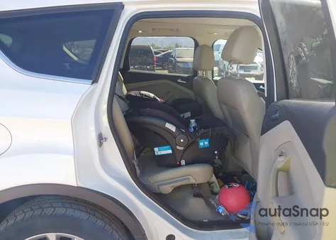 2014 Ford Escape Titanium z USA, uszkodzony, nr VIN 1FMCU0JX2EUE46868